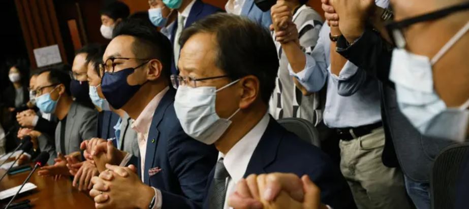 Hong Kong opposition lawmakers all quit after four members ousted